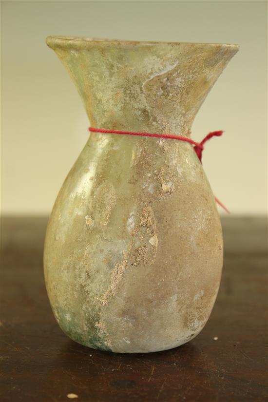 An Islamic glass vase, c.9th century A.D., 13cm, repair